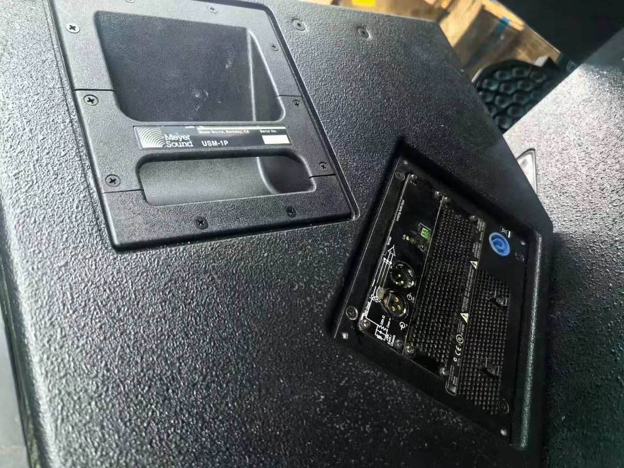 Supplied photograph of Meyer Sound USM-1P; identity and availability require confirmation — photograph 2
