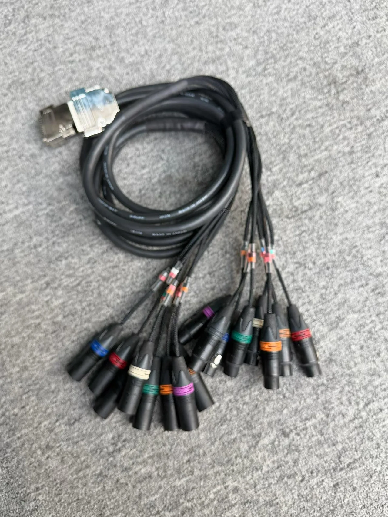 Supplied photograph of Unbranded / to confirm DB25 to XLR loom; identity and availability require confirmation — photograph 1