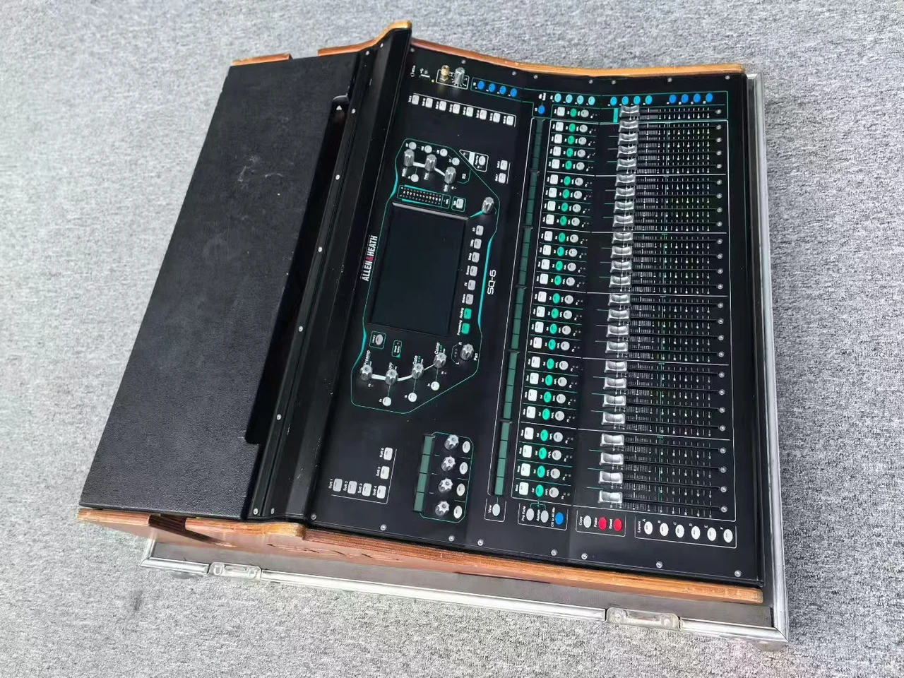Authorized supplied photograph of an Allen & Heath SQ-6 in a case